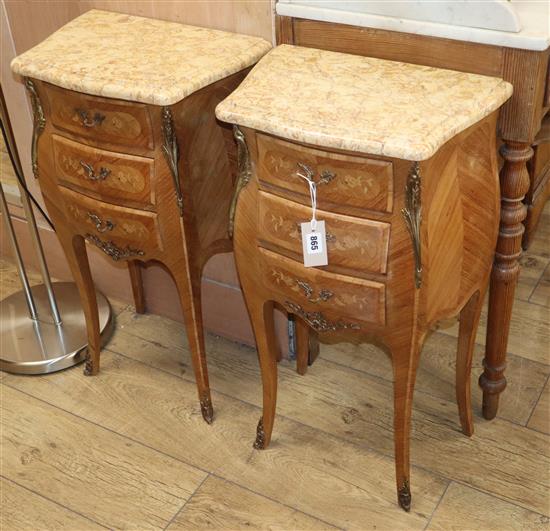 A pair of inlaid bombe bedside chests W.42cm